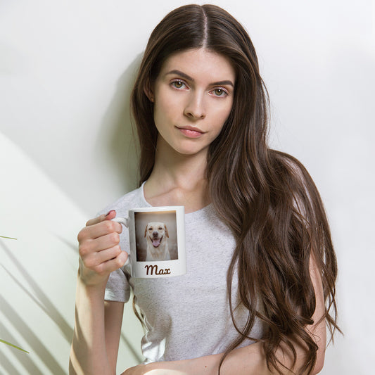 Woman holding a custom dog photo mug printed with a Labrador and the name Max